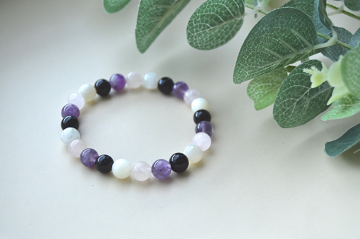 Ametyst, rosenkvarts, obsidian og månestein armbånd