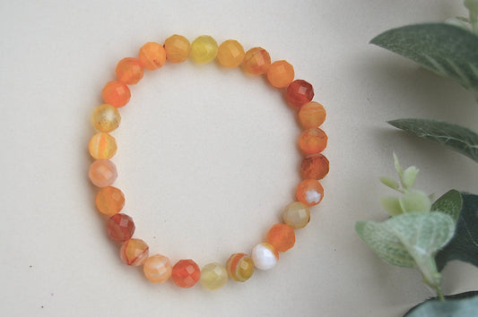 Oransje agat fasettarmbånd – balanse, styrke og indre ro