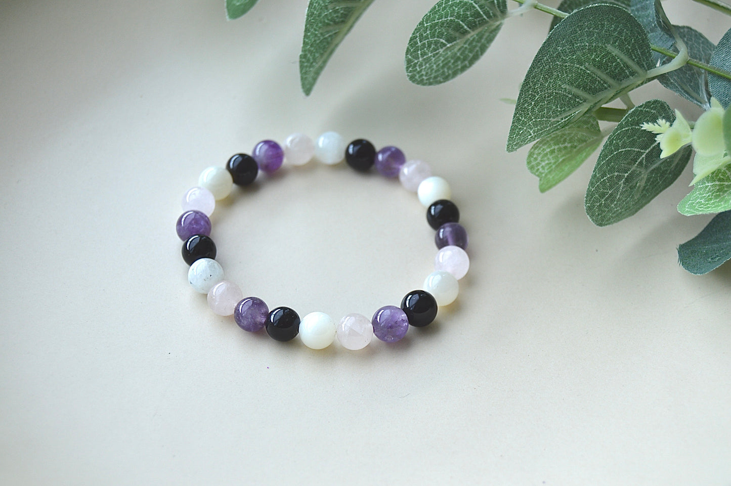 Ametyst, rosenkvarts, obsidian og månestein armbånd