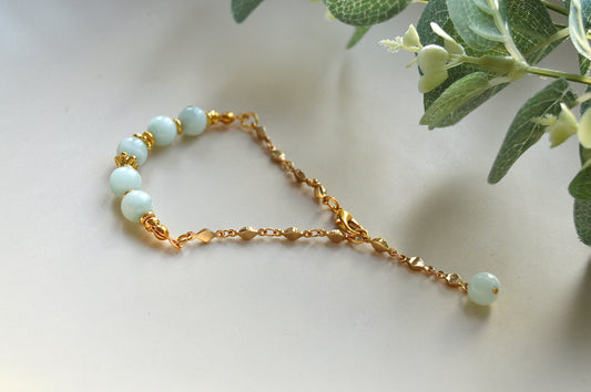 Larimar armbånd med gullbelagte detaljer - ro, balanse og avslappende energi