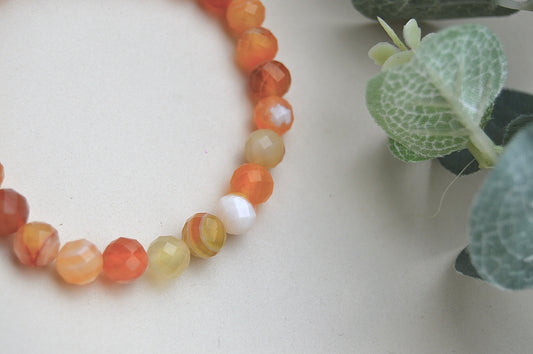 Oransje agat fasettarmbånd – balanse, styrke og indre ro